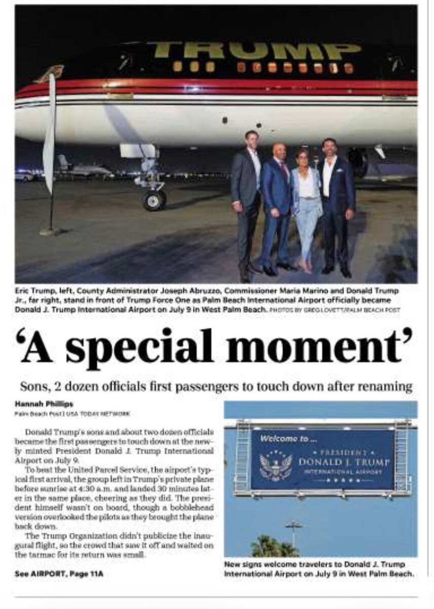 Eric Trump, County Administrator Joseph Abruzzo, Commissioner Maria Marino and Donald Trump Jr. stand in front of Trump Force One at Donald J.