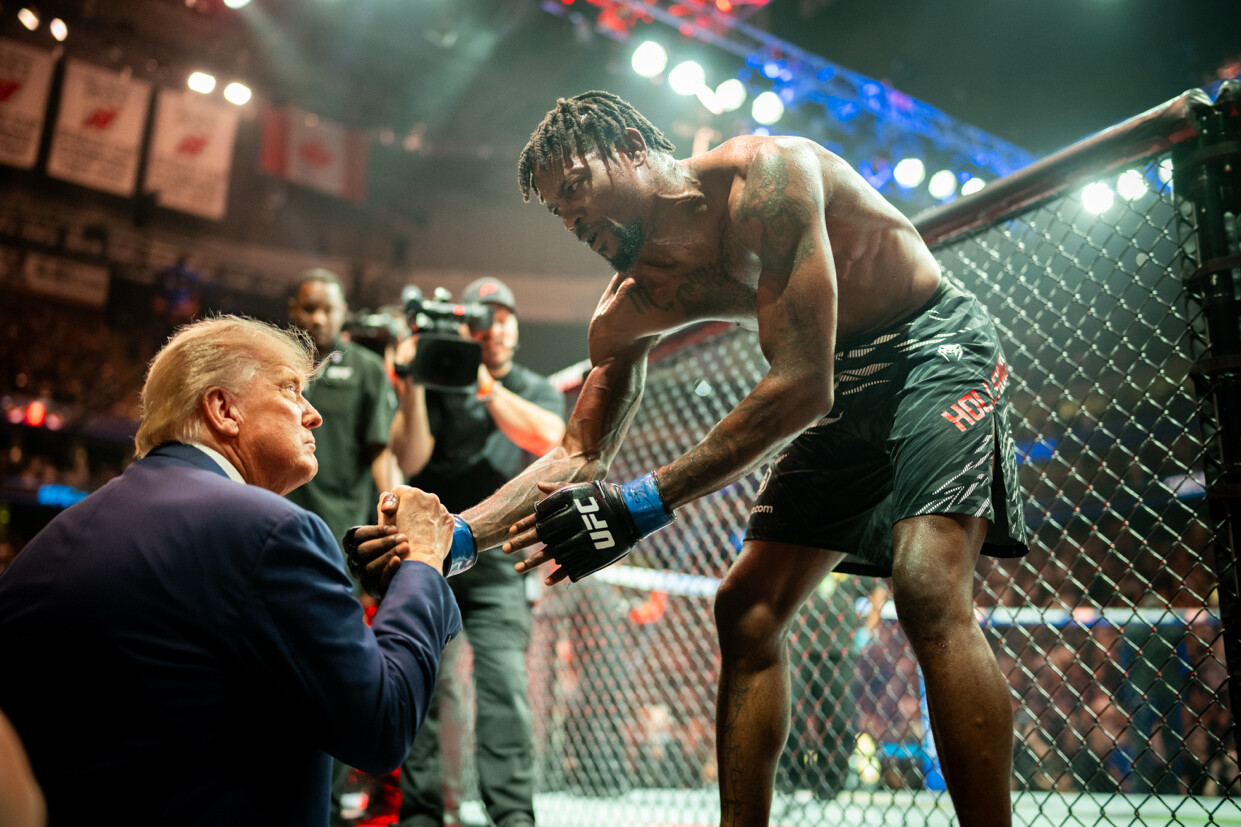 President Donald J. Trump clasps hands with a fighter at a UFC event in Canada on 07/14/2026.